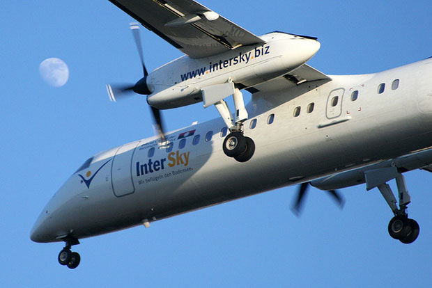 A plane taking off from the airport in Berlin, Germany.