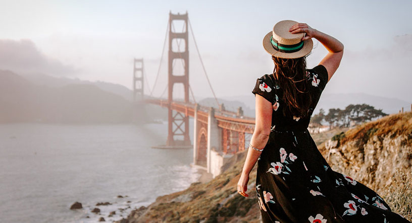 woman looking at golden gate bridge
